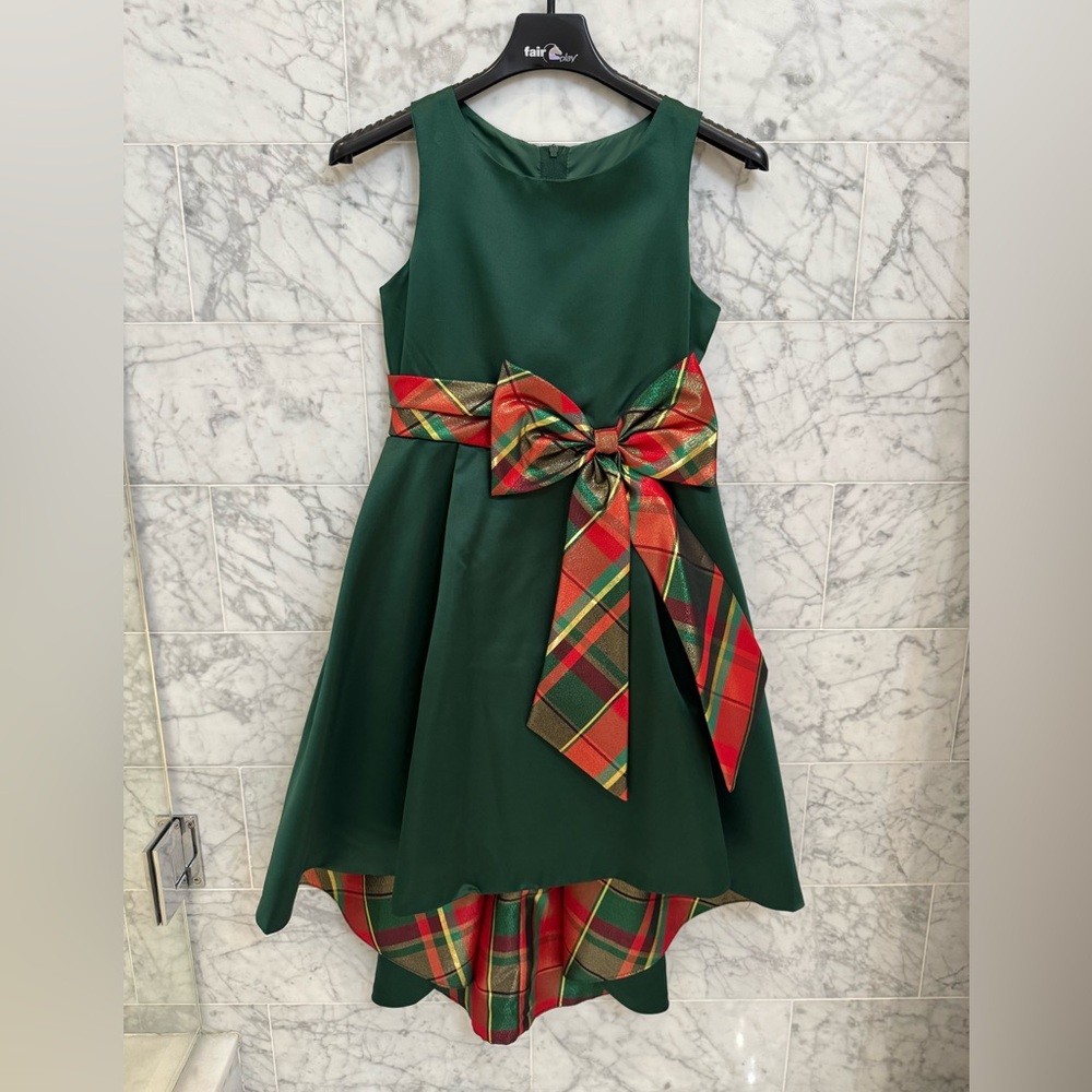 Girls satin holidays dress. Hi-low style. Tartan accents. Size 8. 
New w/o tags.